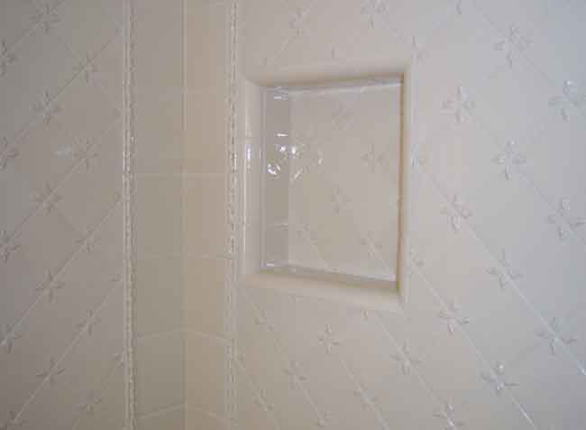 Picture #14 (Shampoo niche) Niches are always a nice feature in any shower or tub stall.  Sometimes surface set porcelain or composite shampoo shelves or soap dishes can be used.