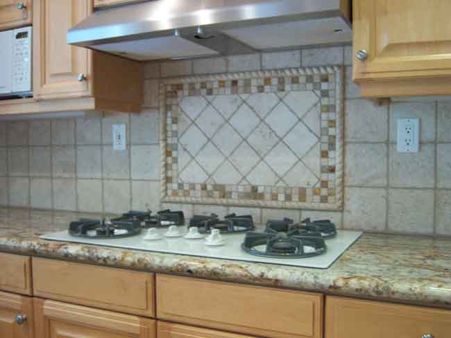 Picture #16 (Backsplash) Features behind stoves come in almost infinite variety.  This rope moulding with glass and stone combination mosaic is perfect for this kitchen.